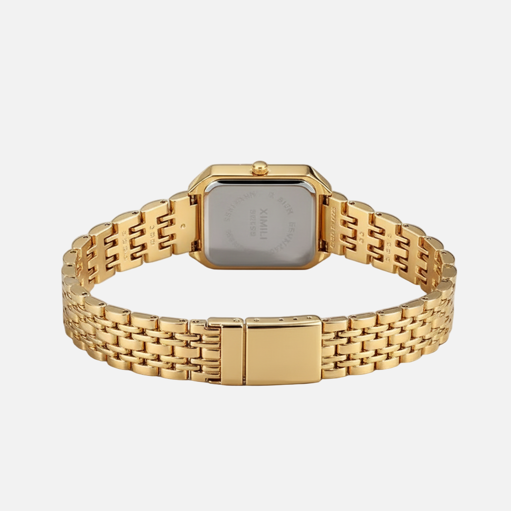 Gold watch with a mesh band on a light gray background